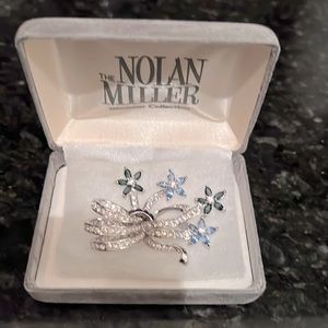 Nolan Miller white & blue crystal pin.